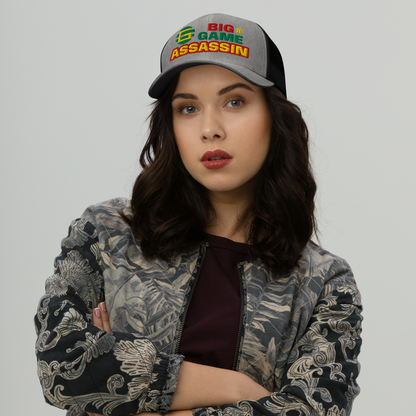 BIG GAME ASSASSIN® Triple C's Trucker Cap (layered text). Red, green and yellow design. Available in a variety of colours. One size.